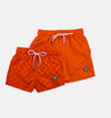 Neon Orange Checker Swim Trunks